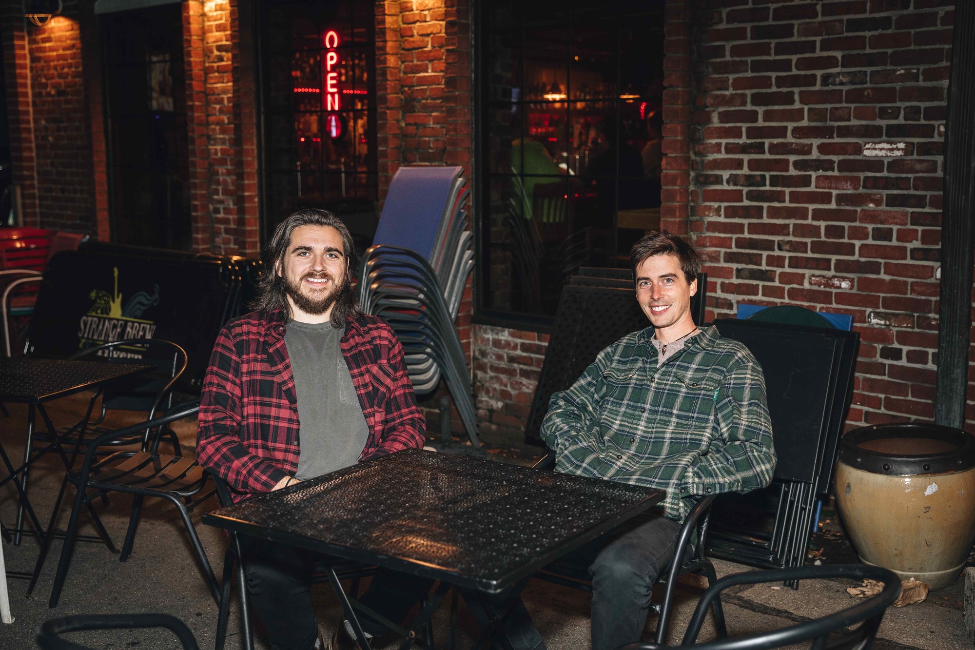 trent and jake outside of strangew brew tavern