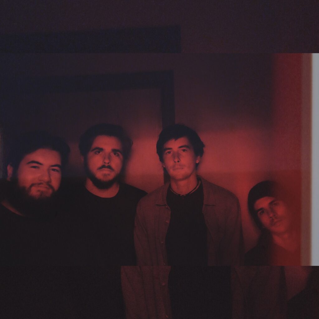 slim volume standing in red light